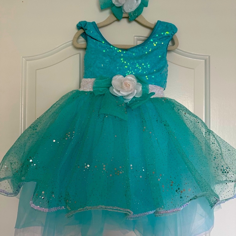 Dancing dress
Sparkling Teal Tutu Dress with Bow